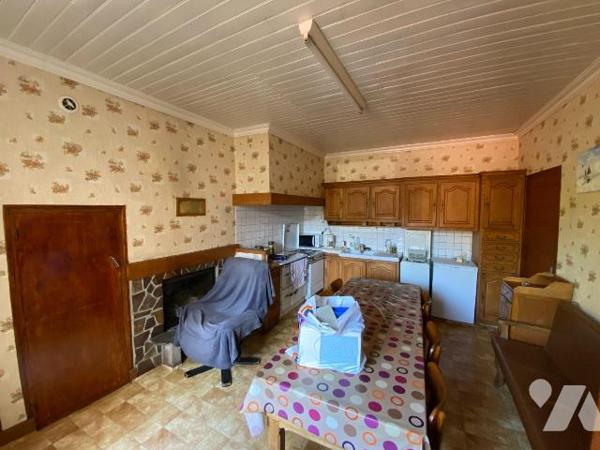 RAULHAC, sur parcelle de 200 m², maison de bourg comprenant sous-sol cave, atelier, garage - RD...