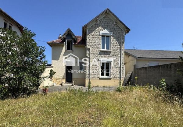 Maison de ville avec garage et jardin