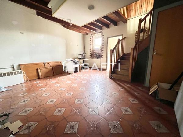 Immeuble comprenant un café tabac et un logement