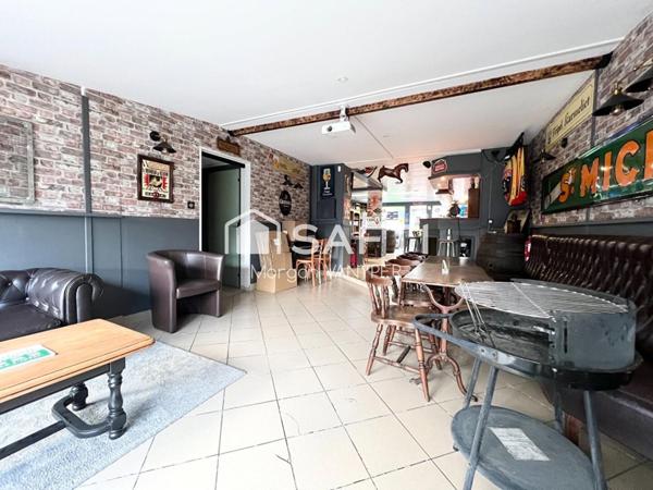 Immeuble comprenant un café tabac et un logement