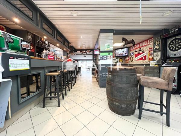 Immeuble comprenant un café tabac et un logement