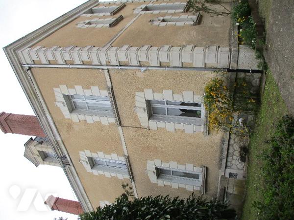 En centre-ville, Maison de Maître