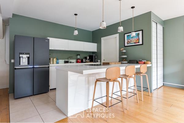 Maison contemporaine réhabilitée dans une ancienne fabrique bas Côté Pavée