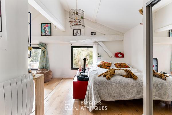 Maison contemporaine réhabilitée dans une ancienne fabrique bas Côté Pavée
