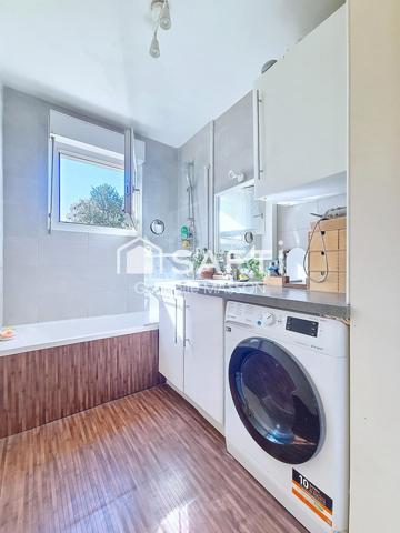 Appartement avec balcon, cave et parking