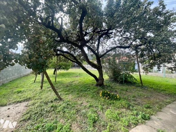 Maison 105 m² avec 2 garages et terrain clos