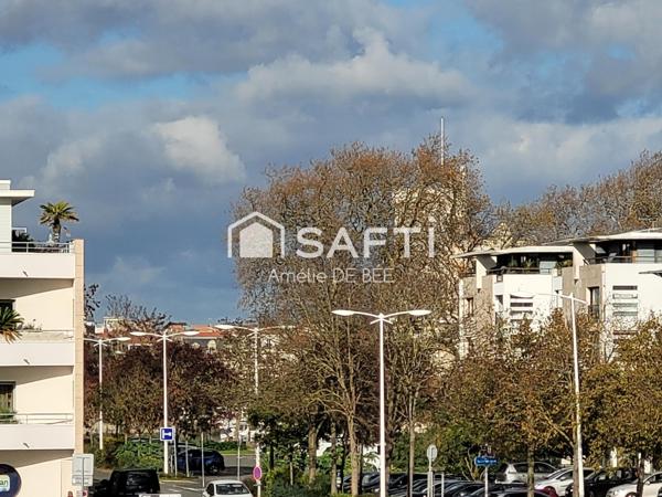 Appartement T 2 , 42 m2, avec terrasse, secteur la ville en bois.