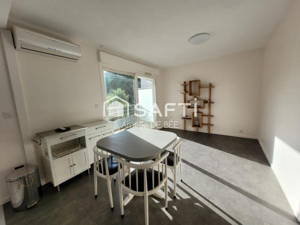 Appartement T 2 , 42 m2, avec terrasse, secteur la ville en bois.