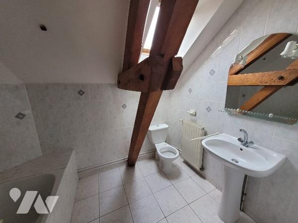 Immeuble avec 5 logements et jardin