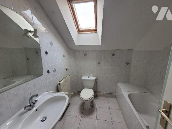 Immeuble avec 5 logements et jardin