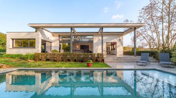 Villa d'architecte dans un écrin de verdure au centre de Castelnau le Lez