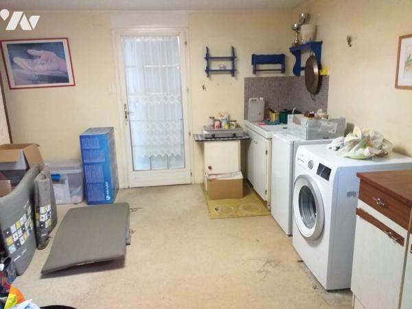 PLESCOP proche du bourg maison sur sous-sol avec un terrain de 1566m² en zone constructible