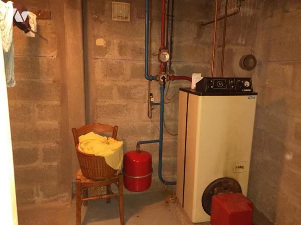 PLESCOP proche du bourg maison sur sous-sol avec un terrain de 1566m² en zone constructible