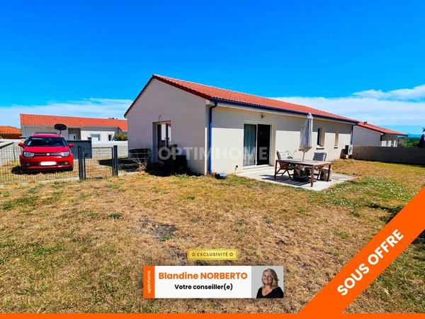 Villa de plain pied 94 m² -  3 chambres -  garage -  jardin à Vertaizon 63