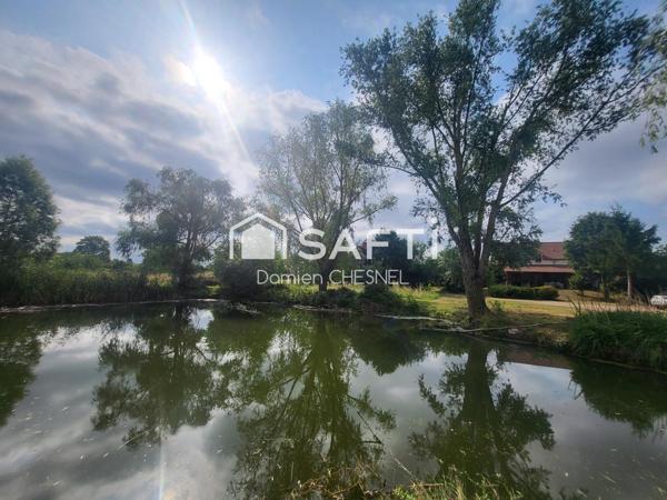 Maison de caractère 223 m² avec étang et presqu’île sur 1,3 ha arboré