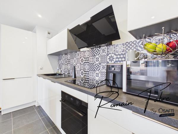 Appartement T3 avec 2 chambres et balcon dans une résidence sécurisée et arborée