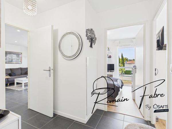 Appartement T3 avec 2 chambres et balcon dans une résidence sécurisée et arborée