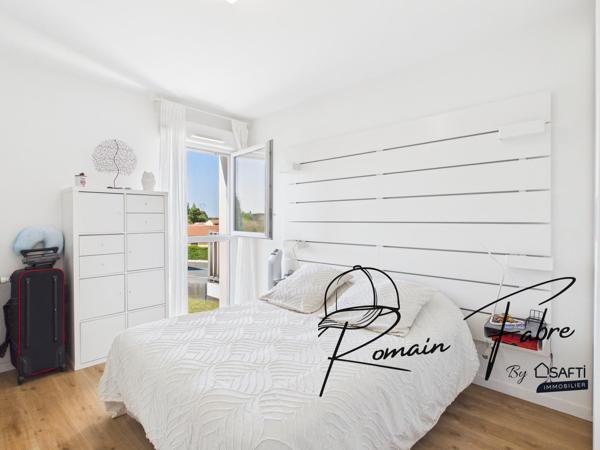 Appartement T3 avec 2 chambres et balcon dans une résidence sécurisée et arborée