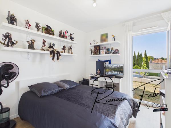 Appartement T3 avec 2 chambres et balcon dans une résidence sécurisée et arborée