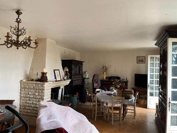 Maison sur sous sol avec garnd terrain arboré