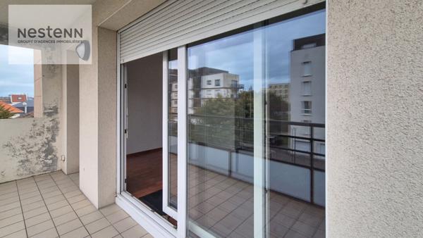 Appartement de 64 m2 comprenant 2 chambres + balcon + ascenseur + parking privé dans résidence sécurisée