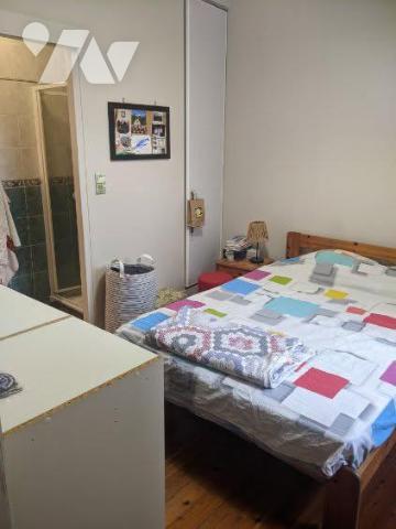 Miroir/ Batingolle Maison de 81 m² deux chambres, véranda donnant accès au jardin avec terrasse 
