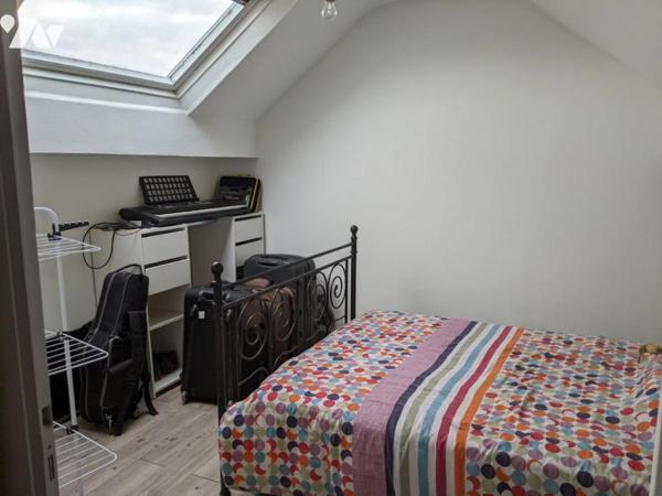 Miroir/ Batingolle Maison de 81 m² deux chambres, véranda donnant accès au jardin avec terrasse 