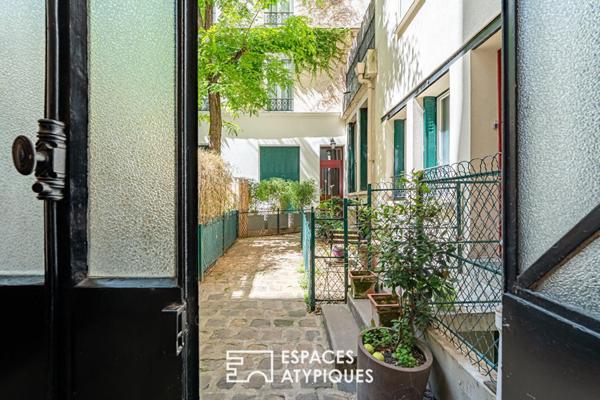 Duplex inversé en cour anglaise arborée, au coeur de l’île de la Jatte.