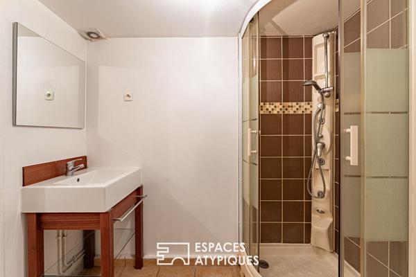 Duplex inversé en cour anglaise arborée, au coeur de l’île de la Jatte.