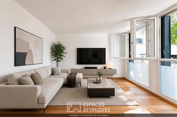 Duplex inversé en cour anglaise arborée, au coeur de l’île de la Jatte.