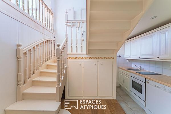 Duplex inversé en cour anglaise arborée, au coeur de l’île de la Jatte.