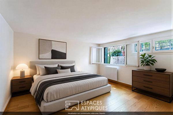 Duplex inversé en cour anglaise arborée, au coeur de l’île de la Jatte.