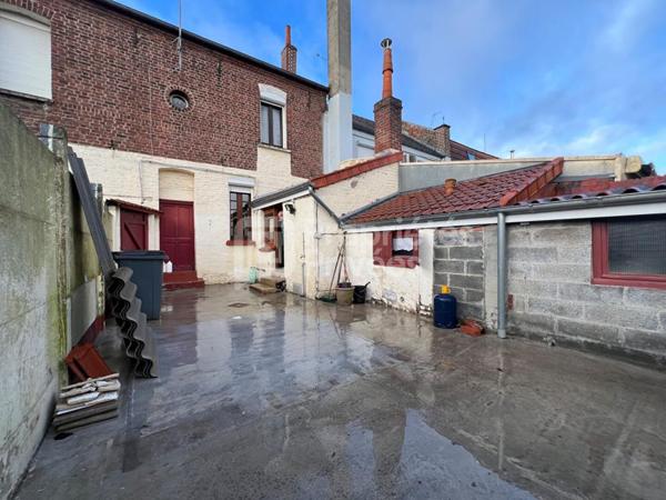Maison de ville à Bruay-La-Buissière avec jardin, cour et potentiel d'aménagement