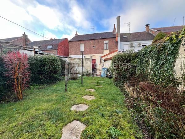 Maison de ville à Bruay-La-Buissière avec jardin, cour et potentiel d'aménagement