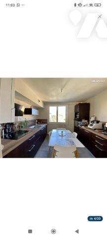 Appartement T5 avec jardin, garage, cave 