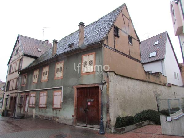 Immeuble à rénover avec un local commercial
