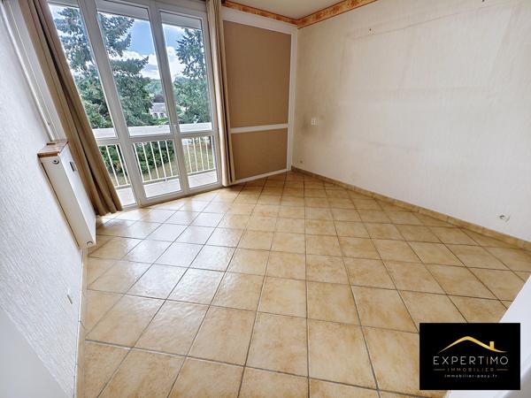 Appartement 4 pièces 76,55 m² avec balcon, cave et parking dans une résidence sécurisée