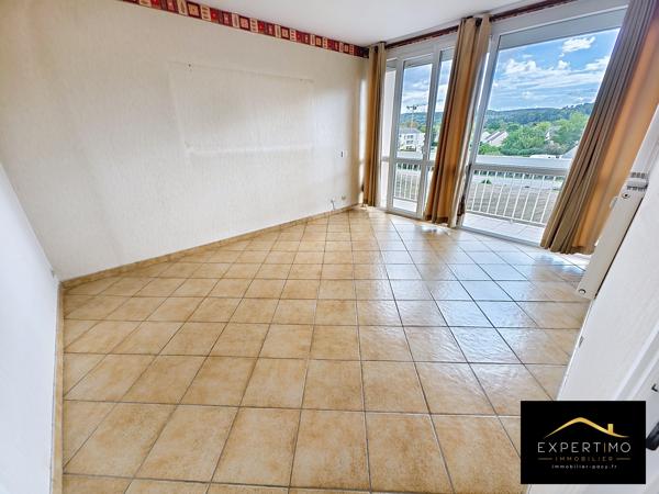 Appartement 4 pièces 76,55 m² avec balcon, cave et parking dans une résidence sécurisée