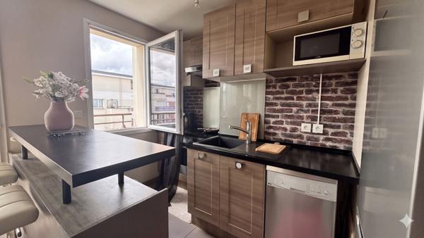 Grand F2 vendu loué avec balcon et parking sous-sol