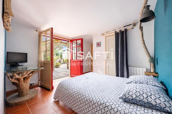 Maison esprit vacances + revenus locatifs 2 400€/mois