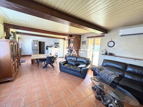 Maison plain pied de 103 m2 environ avec garage et jardin clos