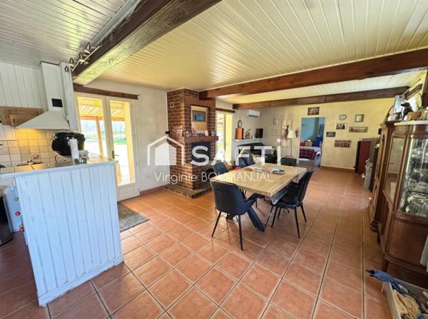 Maison plain pied de 103 m2 environ avec garage et jardin clos