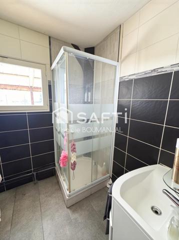 Maison plain pied de 103 m2 environ avec garage et jardin clos