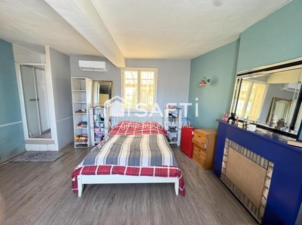 Maison plain pied de 103 m2 environ avec garage et jardin clos