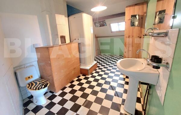 SECTEUR RECHERCHE : GRANDE MAISON INDIVIDUELLE élevée sur un sous sol total avec jardin et garage 