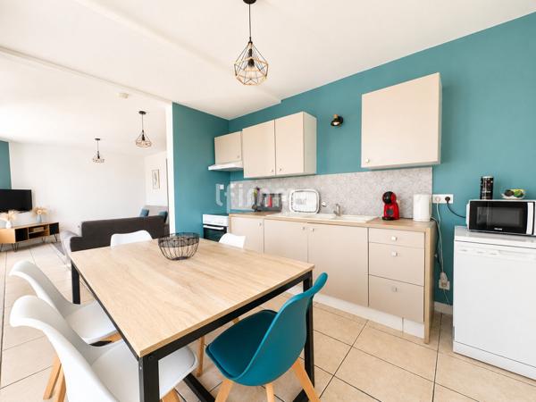 Appartement rez de chaussée 67m² 2 places de parking jardin 248m²