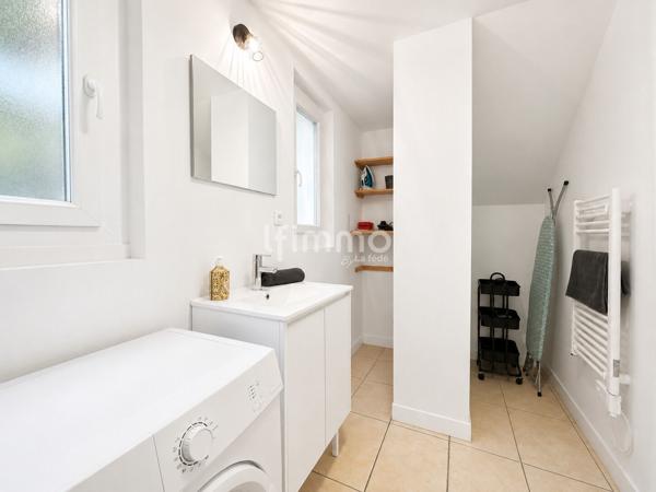 Appartement rez de chaussée 67m² 2 places de parking jardin 248m²