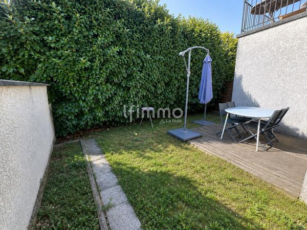 Appartement rez de chaussée 67m² 2 places de parking jardin 248m²