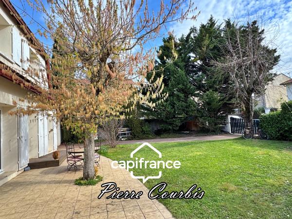 BRON CENTRE Maison 7 pièces avec grand garage et sous-sol