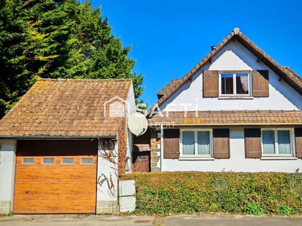 Maison avec garage et jardin
